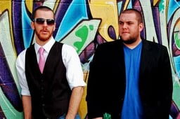 The Floozies & Too Many Zooz logo