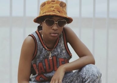 Dej Loaf Logo
