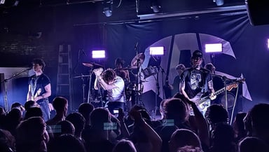 Quarters Of Change Logo